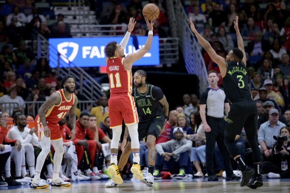 Young s 22 points 12 assists lead the Hawks past the Pelicans 123